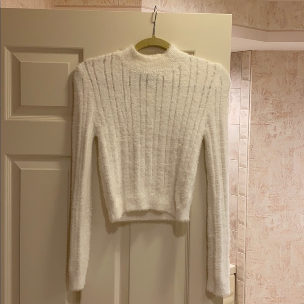 White fuzzy sweater